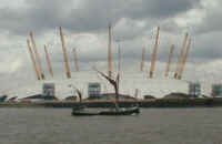 Sailing barge passing Millennium Dome - copyright Greenwich 2000